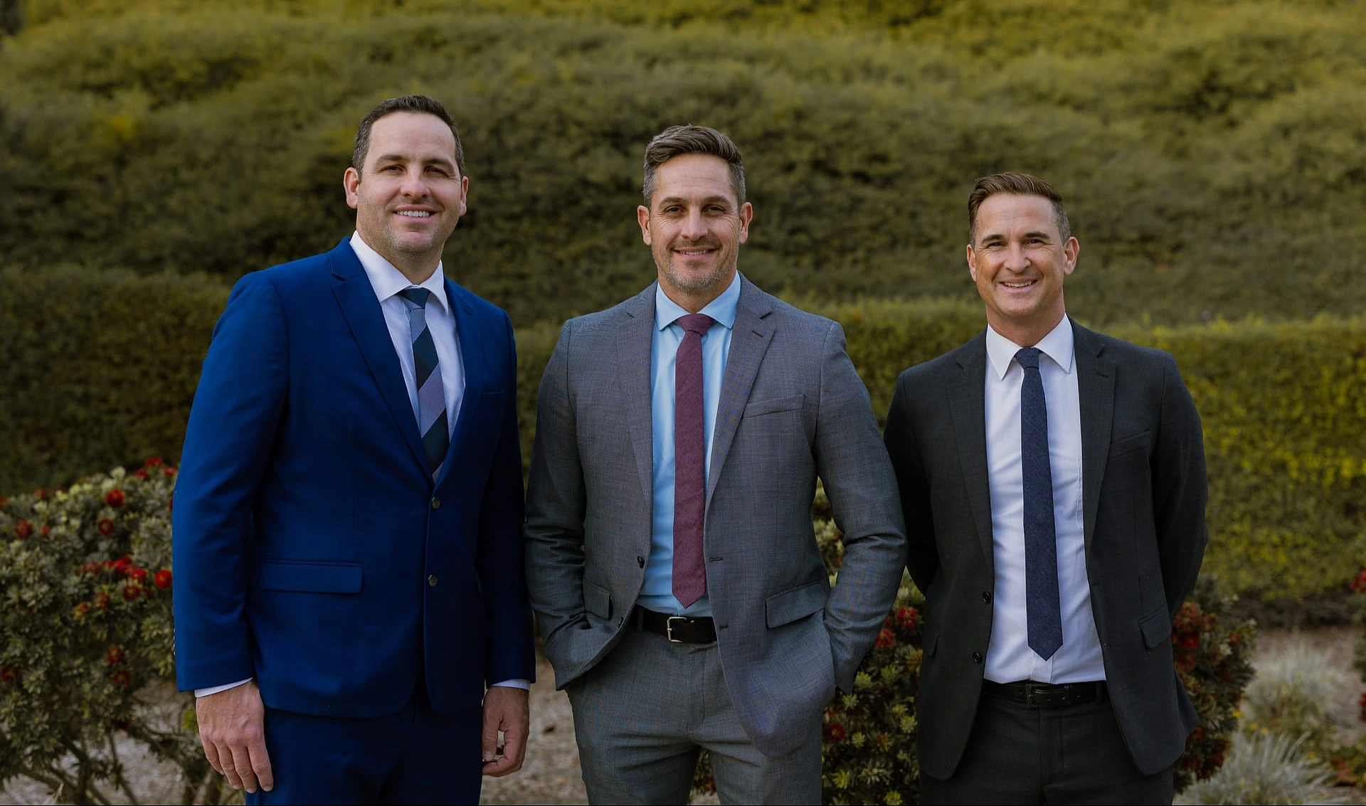 The Devoted Injury Lawyers team - Jeff Waldron, Derek Waldron, and Jeff Yates outside the Oceanside, CA office